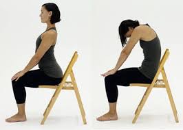 10 Yoga Poses You Can Do In A Chair Chair Pose Yoga Chair Yoga Easy Yoga Poses