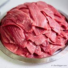 How To Make Traditional Beef Jerky Tray Of Meat Sliced On The Berkel Slicer Beef Jerky Recipes Oven Beef Jerky Beef Jerky Recipe Oven