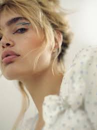 Model, singer and Dire Straits offspring Staz Lindes rocks summer's coolest  beauty looks