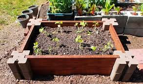 To make the bed even stronger, push a length of rebar down through the holes on each corner. Easy Raised Garden Bed Building A Diy Raised Vegetable Garden Bed