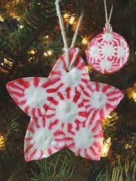 If you're looking for a new new ornament to make with your kids this year, check out this simple candy cane christmas ornament craft. Peppermint Candy Christmas Ornaments