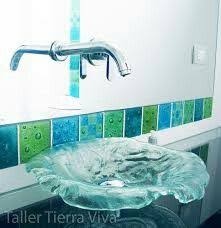 The counter in this award wining bathroom is an art photography image printed on steel and toped with glass to create a cool watery landscape for lovely handblown glass sea creatures and natural stone objects. Pin By Madelyn Du Preez On Bathroom Ideas Glass Sink Diy Glass Fused Glass
