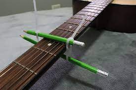 I lost my capo a couple of weeks ago, and i've been working on several songs that require one. 4 Steps On How To Make Homemade Guitar Capo Diy