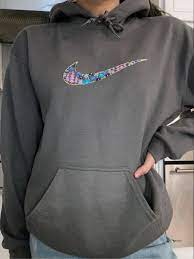 Maybe you would like to learn more about one of these? Embroidered Nike Logo Filled With Flowers On A Sweatshirt Etsy Clothes Embroidery Diy Embroidery Hoodie Embroidered Clothes