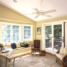 Comfy Sunroom Interior Nuance With Gold Wall Paint Color And Excellent Bay Window And Classic Rustic Living Room Vaulted Ceiling Living Room Living Room Paint