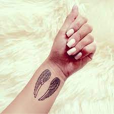 3 placements of angel wings tattoos. 28 Astonishing Angel Tattoo Ideas Small Wrist Tattoos Angel Wing Wrist Tattoo Basic Tattoos