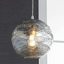 Swirling Glass Globe Pendant Light Light Patterns Dance On The Walls And Ceiling From The Swi Glass Globe Pendant Light Globe Pendant Light Glass Globe Pendant