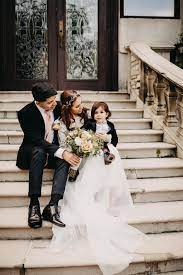 Bride And Groom With Son Bride And Groom Family Portrait Intimate Wedding Photographer Intimate Wedding Wedding Photographers