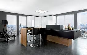 En choisissant le noyer par exemple, la composition prendra des airs vintage, évoquant le mobilier des années 1960. Meuble Noir Et Bois Idees Deco Cuisine Dressing Salon Blog Schmidt