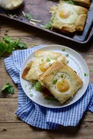 This popular breakfast recipe has many names like toad in the hole. Brunchweek Baked Toad In A Hole Breakfast Sandwiches Sarcastic Cooking