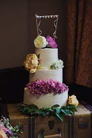 A Watters Wedding Dress For A Colourful Vintage Travel Theme Celebration Love My Dress Uk Wedding Blog Wedding Directory Wedding Cake Designs Simple Wedding Cake Decorations Wedding Cake Rustic