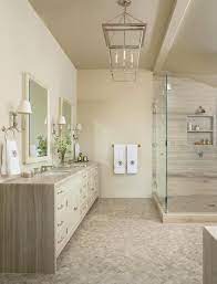 Shades of pale gray play with navy blue among the wall tile patterns in this small bathroom corner. 16 Beige Bathroom Ideas For A Relaxing Spa Worthy Escape Better Homes Gardens