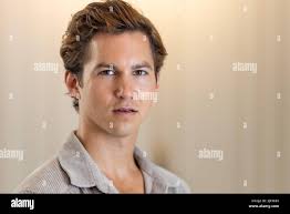 Munich, Germany. 28th June, 2022. Tim Oliver Schultz, actor, during a photo  session at the "Bayerischer Hof" hotel. Schultz stars in the TV series  "Damaged Goods," which premieres at the Munich Film