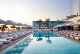 A Line Of Tuuci Parasols On The W Barcelona Deck Barcelona Hotels W Hotel Barcelona Hotel Exterior