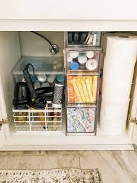 Create storage by adding stackable drawers. Organizing Under The Bathroom Sink Delightful Order