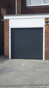 Hormann Sectional L Ribbed Garage Door In Anthracite Grey Garage Door Styles Brick Exterior House Garage Door Design