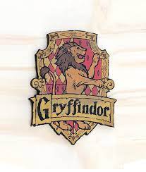 Harry Potter Inspired Gryffindor House Crest Wooden Cutout Etsy Harry Potter Wall Decor Harry Potter Wall Gryffindor