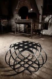 Dunja Weber Has Designed The Megaweave Outdoor Seat Made Of Intertwined Wrought Iron Bars Con Iron Furniture Design Wrought Iron Furniture Wrought Iron Design