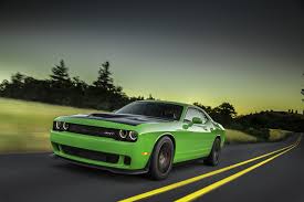 While the navigation responds quickly to inputs with a large onscreen keyboard, the map graphics look dated and cartoony. 2015 Dodge Challenger Srt Hellcat First Drive Review