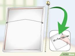 It can be inserted in the wall. How To Hang A Large Canvas 11 Steps With Pictures Wikihow