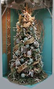 You don't necessarily have to live in a beach home to decorate in this style. 30 Brilliant Coastal Chic Christmas Tree Decorating Ideas