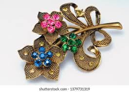 metal brooch