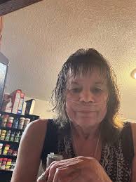 Can someone remove people from photos?