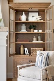 Tall Brown Oak Freestanding Cabinet With Glass Doors Cottage Living Room