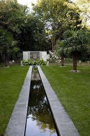 Water Feature Flowing Into A Rill Pool Water Features Garden Inspiration Small Water Features