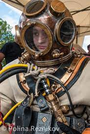 Woman In Heavy Gear Ready To Go Underwater Scuba Diver Girls Diving Helmet Diving Suit
