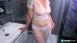 Naughty granny Nicol Mandorla undressing and teasing in the shower room -  Glav Matures