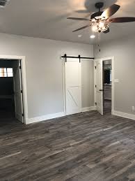 Also, it really isn't worth spending money on an exotic hardwood to stain gray when you can purchase domestic woods(like oak) for a fraction of the cost and allocate that towards staining your floors gray. Master Bedroom House Flooring Home Decor Agreeable Gray Living Room