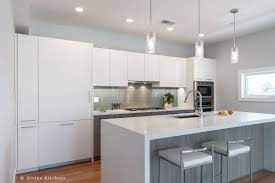 Cambridge ready to assemble threespine 30 in. Modern Kitchen With Matt White Flat Panel Cabinets And Cambria Countertops Wi Kitchen Cabinets Grey And White Flat Panel Kitchen Cabinets White Modern Kitchen