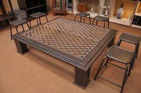 But it also fits right into a traditional, family home with teas.e. Square Industrial Grate Coffee Table 3
