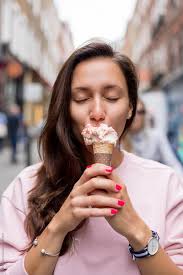 Beautiful Young Woman Eating Ice Cream In Covent Garden London By Mem Studio Stocksy United In 2020 Eating Ice Cream Ice Cream Eat