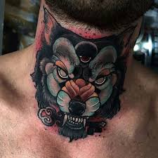 A white wolf tattoo hints at a unique personality. Wolf Neck Tattoo