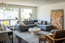Browse modern living room decorating ideas and furniture layouts. Forget Gallery Walls Big Art Is The Hottest Trend In Wall Decorating Hgtv S Decorating Design Blog Hgtv