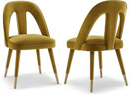 The velvet dining chair toby has a nice seat with a horizont. Pigalle Velvet Dining Chair Dining Chairs