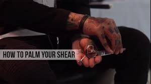 The hair above your fingers will be trimmed away. How To Palm Your Shears During Special Haircut Hairstylist