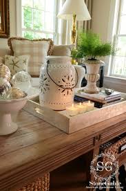See more ideas about table centerpieces, coffee table centerpieces, centerpieces. 5 Tips To Style A Coffee Table Like A Pro Stonegable Coffee Table Decor Tray Decorating Coffee Tables Tray Decor