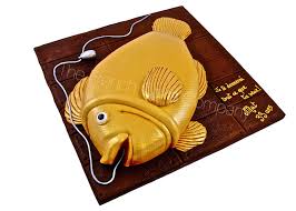 Fondant fisherman, boat, and other decorations. Gold Fish Birthday Cake The French Cake Company