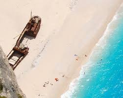 Jump across the broken bridge. Navagio Shipwreck Beach Greece