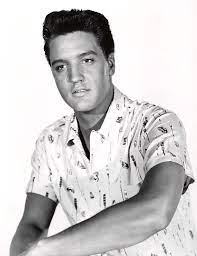1 it was originally released as a single in 1961 by american singer elvis presley , who enjoyed a no. Elvis Presley In Blue Hawaii 1961 Photograph By Album