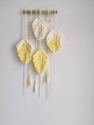 Maybe you would like to learn more about one of these? Small Macrame Wall Hanging Feathers Nursery Boho Home Decor Etsy Diy Wall Hanging Yarn Macrame Wall Hanging Macrame Patterns