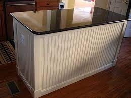 He worked hard to get the bar finished before our painters came to paint inside. Pin By Joan Stauth On Housing Plans Beadboard Kitchen Kitchen Island Makeover Home Kitchens