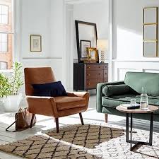 This role can also be performed by the coffee table, fireplace and lots of other features. Amazon Brand Rivet Jamie Leather Mid Century Modern Low Arm Accent Chair 31 W Cognac Mid Century Modern Living Room Furniture Modern Furniture Living Room Mid Century Modern Living Room