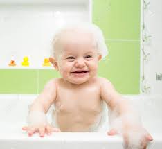 Bathing a newborn is about safety and comfort. Happy Baby Taking Bath In Bathroom Stock Photo Picture And Royalty Free Image Image 28455729