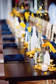 Pin By Carolyn Robistow On For The Big Day Wedding Table Flowers Blue Wedding Flowers Yellow Wedding Theme