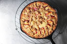 In a large bowl, preferably metal, combine cream and bourbon. Peach Brown Butter Buckle