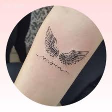 Angel wings symbolize protection and guidance, similar to an angel or guardian angel tattoos. Angel Wings Tattoo On Hand Tattoo Mode